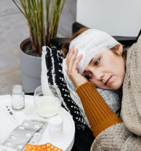  Medical Malpractice Lawyer in Israel - image of an injured woman staring worriedly at medication